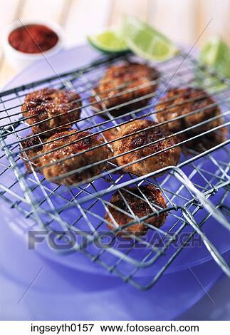 Stock Photo - bbq, skewer, kebab, chicken, chicken pieces, dip, food. Fotosearch