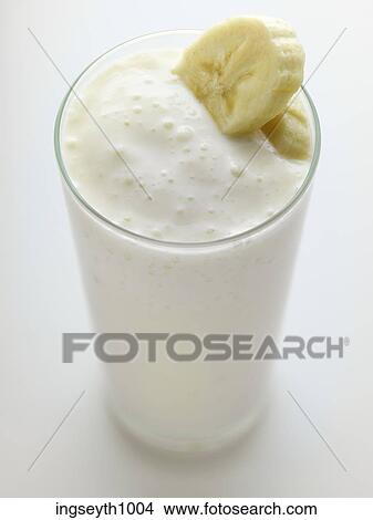 Picture - Bottle and a glass of red wine. Fotosearch