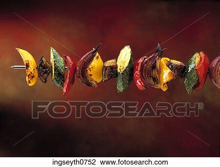 Stock Image - Bottle and a glass of red wine. Fotosearch