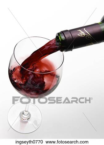 Bottle and a glass of red wine View Large Photo Image Stock Image - Bottle and a glass of red wine. Fotosearch