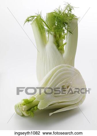 Stock Image - Bottle and a glass of red wine. Fotosearch