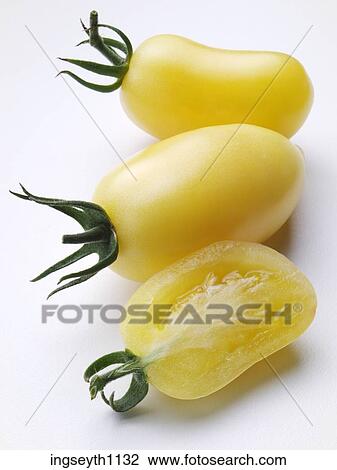 Stock Image - Bottle and a glass of red wine. Fotosearch