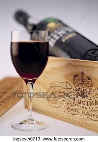 Bottle and a glass of red wine View Large Photo Image Stock Photo - Bottle and a glass of red wine. Fotosearch