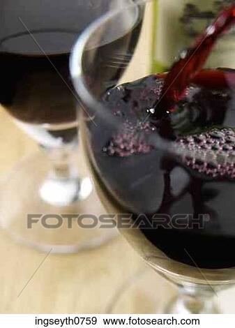 Bottle and a glass of red wine View Large Photo Image Stock Photo - Bottle and a glass of red wine. Fotosearch