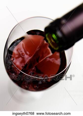 Bottle and a glass of red wine View Large Photo Image Stock Photo - Bottle and a glass of red wine. Fotosearch
