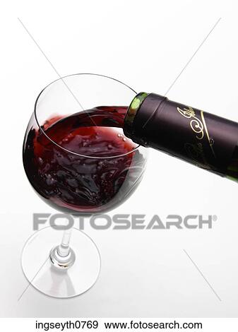Bottle and a glass of red wine View Large Photo Image Stock Photo - Bottle and a glass of red wine. Fotosearch