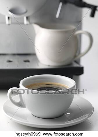 Stock Photo - Bottle and a glass of red wine. Fotosearch