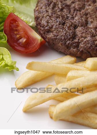 Stock Photo - Bottle and a glass of red wine. Fotosearch