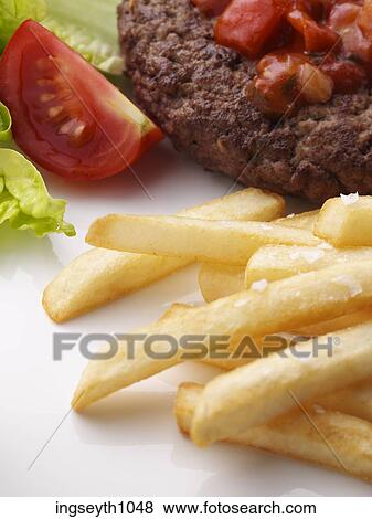 Stock Photo - Bottle and a glass of red wine. Fotosearch