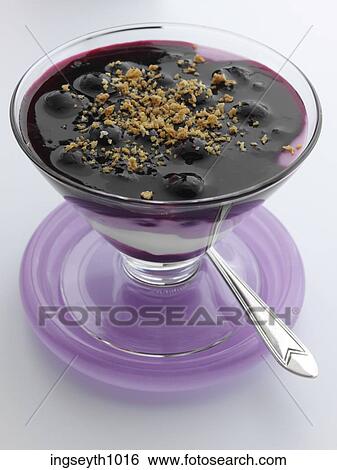 Stock Photograph - Bottle and a glass of red wine. Fotosearch