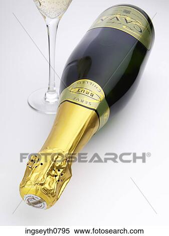 Stock Photography - Bottle and a glass of red wine. Fotosearch