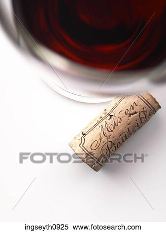 Bottle and a glass of red wine View Large Photo Image Stock Photography - Bottle and a glass of red wine. Fotosearch