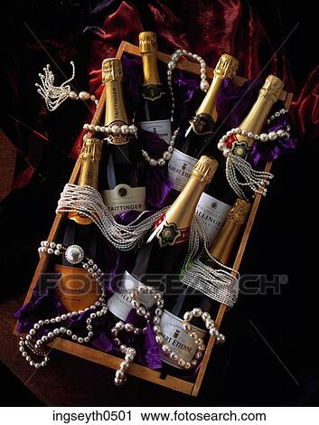 Stock Image - Champagne, champagne bottles, bottles, celebration, hamper. Fotosearch