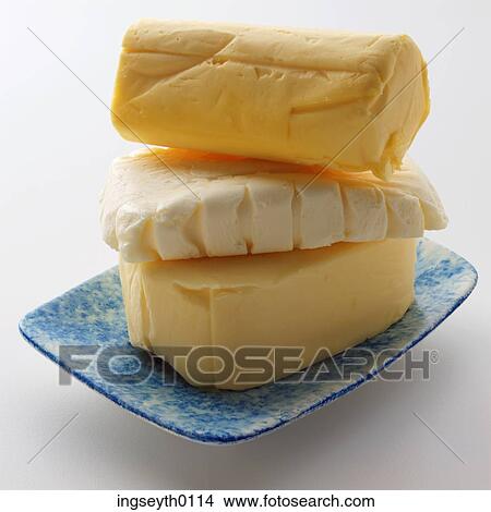 Picture - cheese, cheeses, three, heap, pile, heaped cheese, food. Fotosearch