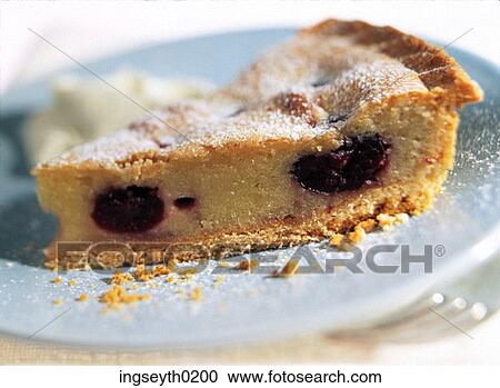 Stock Image - Cherry Bakewell, tart, pudding, sweet, Bakewell, Cherry, food. Fotosearch