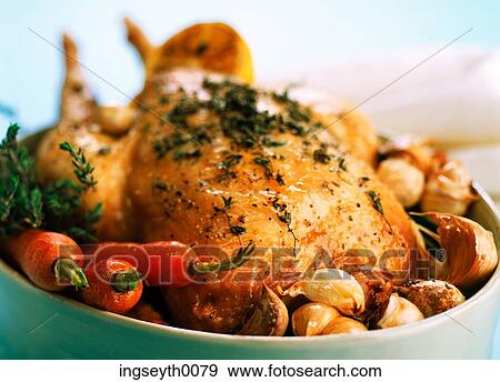Stock Photo - chicken, roast chicken, roast vegetables, food, diet, nutritian, eat. Fotosearch