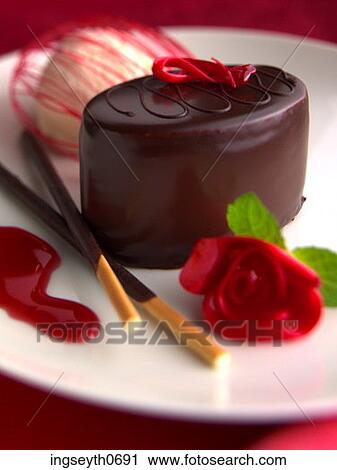 Stock Image - Choc & Ice Creamchocolate pudding, chocolate sponge, chocolate dessert, ice cream, choc, Cream, Ice. Fotosearch