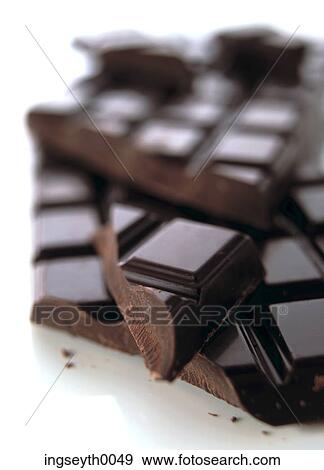 Stock Photo - chocolat, cooking chocolat, dark chocolat, chocolat bar, foil, snack, cubes. Fotosearch