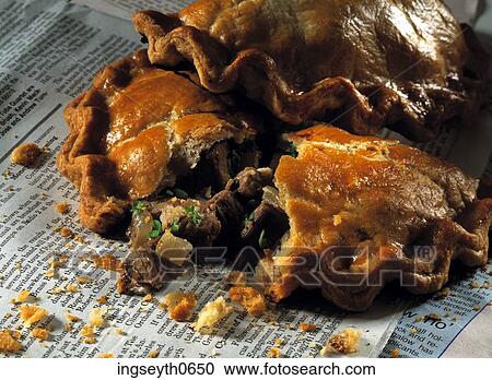 Stock Image - Cornish Pastie, take away, newspaper, Cornish, Pastie, pasties, food. Fotosearch