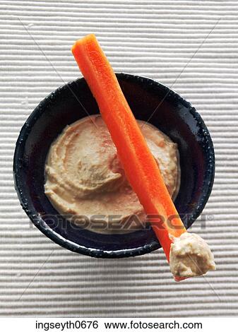 Crudites & Houmous, raw vegetables, raw food, nibbles, finger food, snack, buffet View Large Photo Image Stock Photograph - Crudites & Houmous, raw vegetables, raw food, nibbles, finger food, snack, buffet. Fotosearch