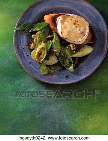 Stock Image - goats cheese & leek, cheese, goats cheese, leek, food, diet, nutritian. Fotosearch