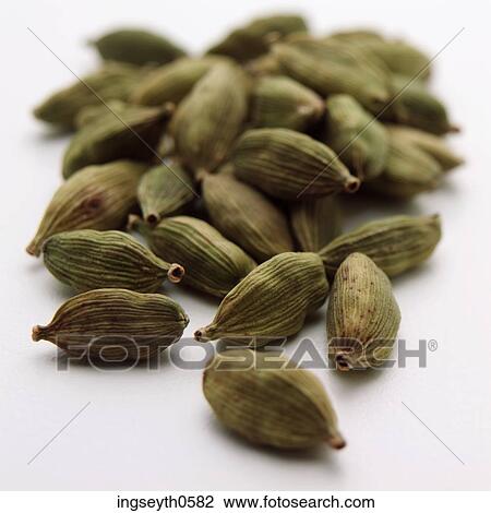 Stock Image - Green Cardammon, spices, flavour, flavouring, flavor, flavoring, Cardammon. Fotosearch
