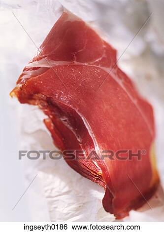 Stock Photograph - ham, serrano, parma ham, slice of ham, food, diet, nutritian. Fotosearch