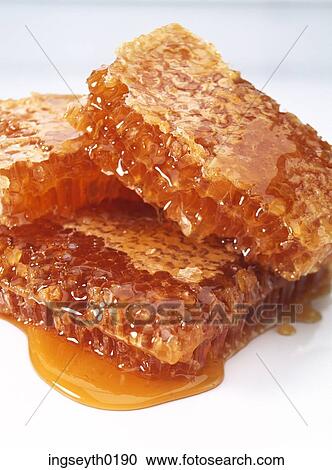 Stock Image - honey, wax, natural, beeswax, honeycomb, food, diet. Fotosearch