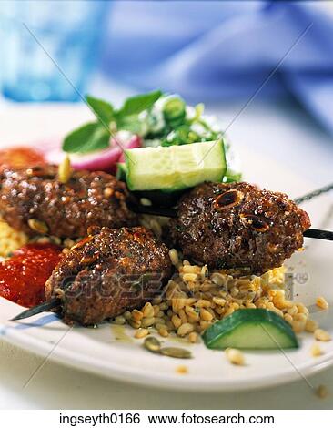 kebab, kebabs, rice, skewer, cucumber, salad, hot meal View Large Photo Image Stock Photograph - kebab, kebabs, rice, skewer, cucumber, salad, hot meal. Fotosearch