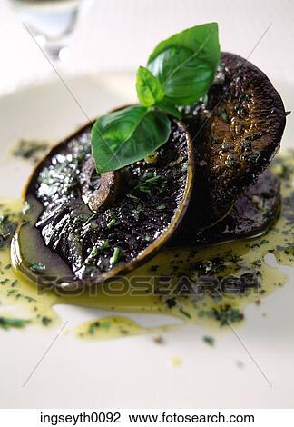 Stock Image - mushroom, starter, cooked mushrooms, bazil, appetizer, first course, snack. Fotosearch