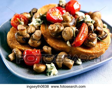 Stock Photo - Mushroom Toast, mushrooms on toast, tomato, tomatoes & mushrooms, Mushroom, Toast, snack. Fotosearch