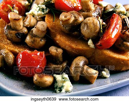 Stock Photo - Mushroom Toast, mushrooms on toast, tomato, tomatoes & mushrooms, Mushroom, Toast, snack. Fotosearch