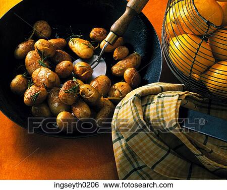 new potatoes, fried potatoes, wok, pan, frying pan, lemons, tea towel View Large Photo Image Stock Photograph - new potatoes, fried potatoes, wok, pan, frying pan, lemons, tea towel. Fotosearch