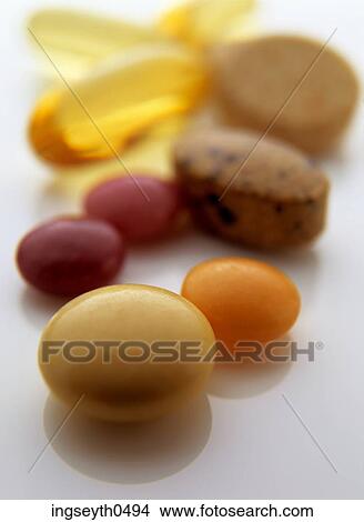 Picture - Pills, vitamins, cod liver oil, capsules, health, healthy, lifestyle Pills. Fotosearch