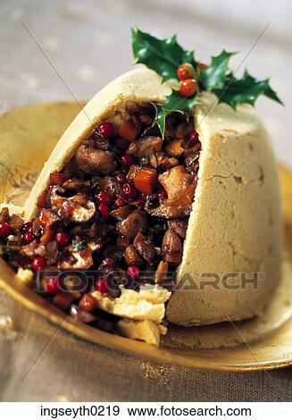 Stock Photo - plum pudding, christmas, dinner, desert, holly, food, diet. Fotosearch