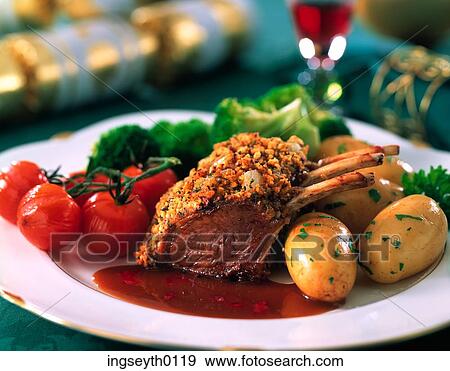 rack of lamb, lamb cutlet, lamb chops, baked tomato, potatoes, new potatoes, dinner View Large Photo Image Stock Photo - rack of lamb, lamb cutlet, lamb chops, baked tomato, potatoes, new potatoes, dinner. Fotosearch
