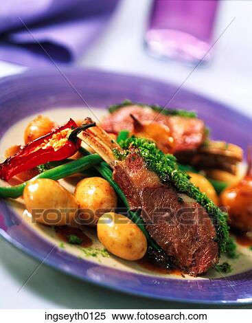 rack of lamb, lamb cutlet, lamb chops, baked tomato, potatoes, new potatoes, dinner View Large Photo Image Stock Photography - rack of lamb, lamb cutlet, lamb chops, baked tomato, potatoes, new potatoes, dinner. Fotosearch