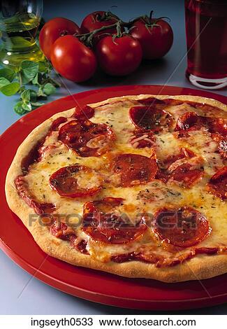Stock Image - Salami PizzaPizza, Salami, pepperoni, italian, round, cheese, chopping board. Fotosearch