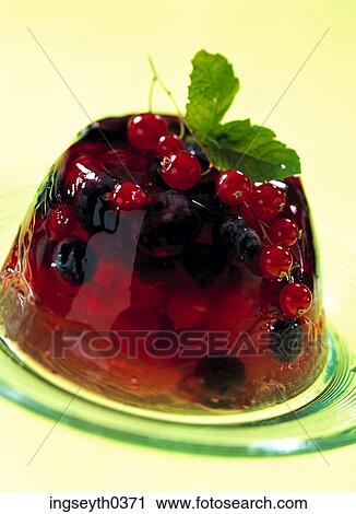Stock Image - summer fruit jelly, raspberries, blackberries, compote, redcurrants, raspberry, blackberry. Fotosearch
