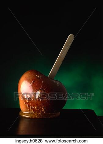 Stock Photo - Toffee Apple, fruit, Apple, Toffee, food, diet, nutritian. Fotosearch