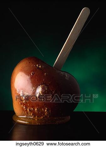 Toffee Apple, fruit, Apple, Toffee, food, diet, nutritian View Large Photo Image Stock Photo - Toffee Apple, fruit, Apple, Toffee, food, diet, nutritian. Fotosearch