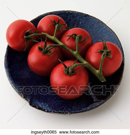 Stock Photography - tomato, tomatoes, vine tomatoes, blue plate, red tomatoes, food, diet. Fotosearch