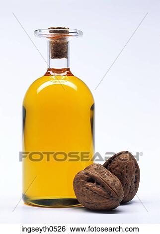 Stock Photograph - Walnut Oil, cooking oil, oil, jar, liquid, Walnut, food. Fotosearch