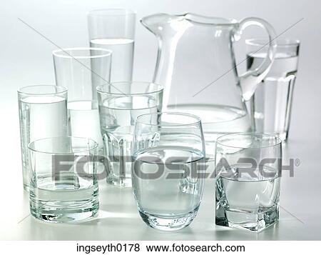 water, glass of water, glasses of water, jug of water, water jug, half filled water glass, cold water View Large Photo Image Stock Photo - water, glass of water, glasses of water, jug of water, water jug, half filled water glass, cold water. Fotosearch