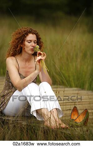A beautiful woman in the countryside View Large Photo Image Stock Photo - A beautiful woman in the countryside. Fotosearch