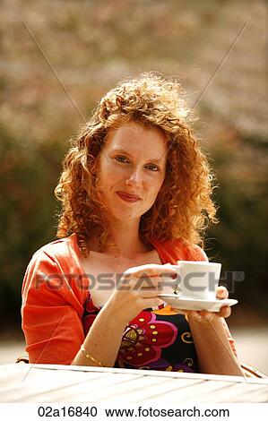 A beautiful woman with a hot drink View Large Photo Image Stock Image - A beautiful woman with a hot drink. Fotosearch