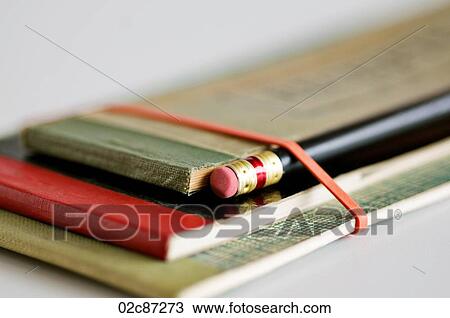 Stock Image - A collection of old vintage receipt books.. Fotosearch