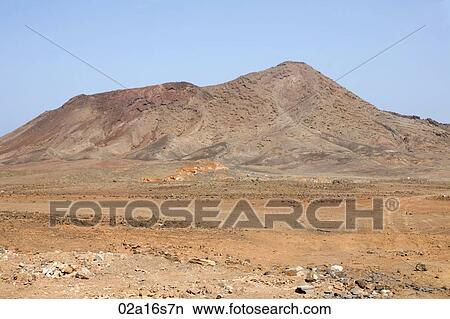 A hill in a desert landscape View Large Photo Image Picture - A hill in a desert landscape. Fotosearch