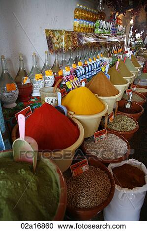 Stock Image - A wide variety of spices on display. Fotosearch