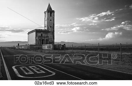 Stock Image - Abandoned building at roadside. Fotosearch